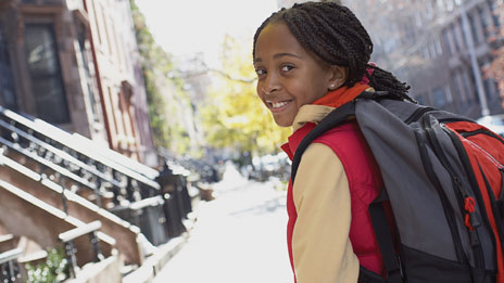 Girl with backpack photo